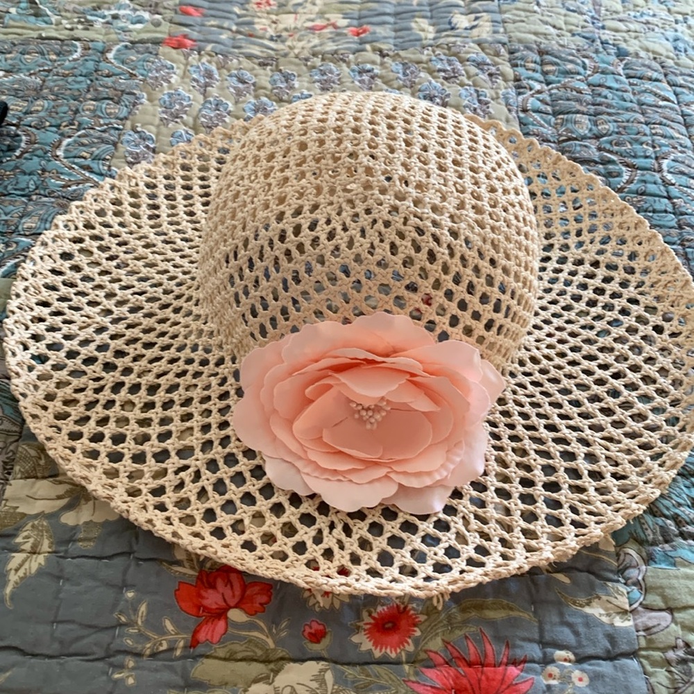 Ladies straw hat with flower